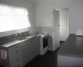 full kitchen facilities and dining area
